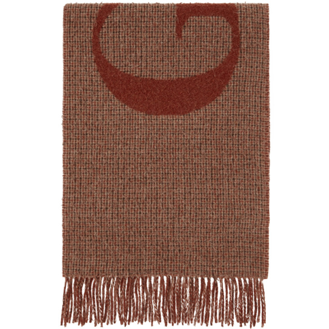 多色格纹矩形双面围巾，采用羊毛混纺针织面料。· 正面橙色针织徽标· 末端流苏细节· 尺寸约为：长 173cm x 宽 35.5cm橙色反面，采用羊毛混纺针织面料。· 正面多色针织徽标供应商配色：Ora