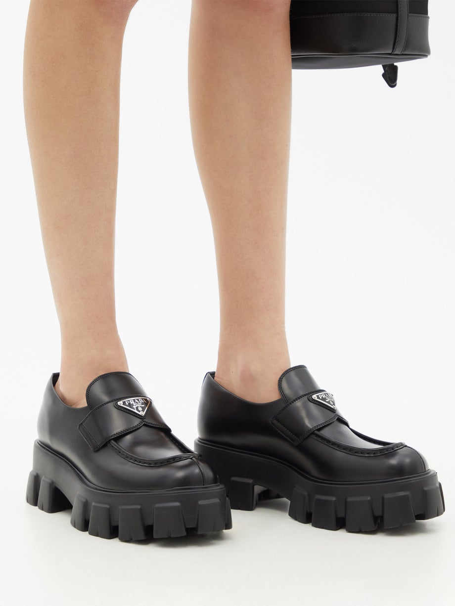 PRADA Triangle-plaque tread-sole leather loafers
