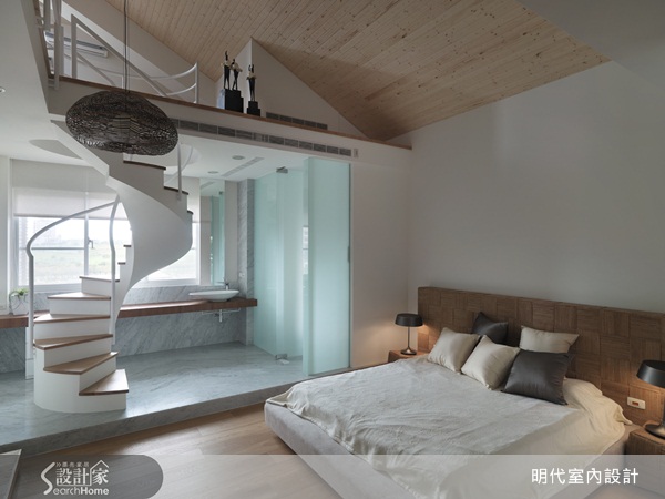 一體成形的螺旋樓梯，以造型線條成為空間視覺中的主角。