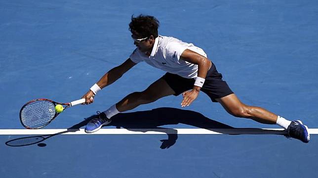 Datang sebagai petenis non-unggulan, Chung Hyeon terus membuat kejutan hingga mampu melangkah ke babak semifinal Australia Terbuka 2018. (REUTERS/Toru Hanai)