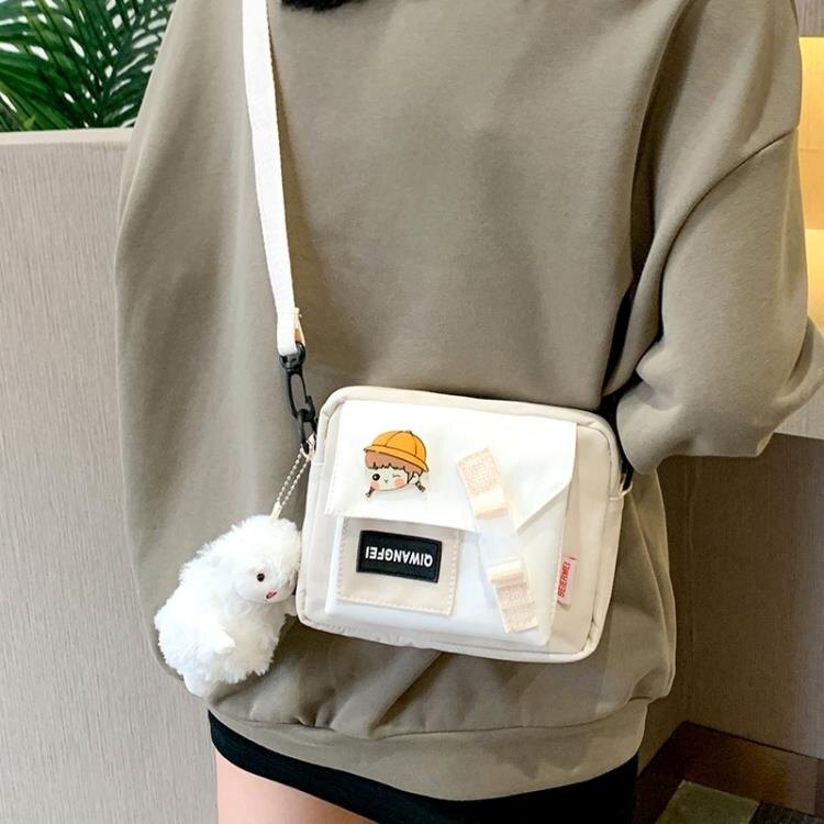 免運 日系單肩包斜背小包包女小眾設計新款百搭學生ins帆布小背包 1995生活雜貨 年終85折大促