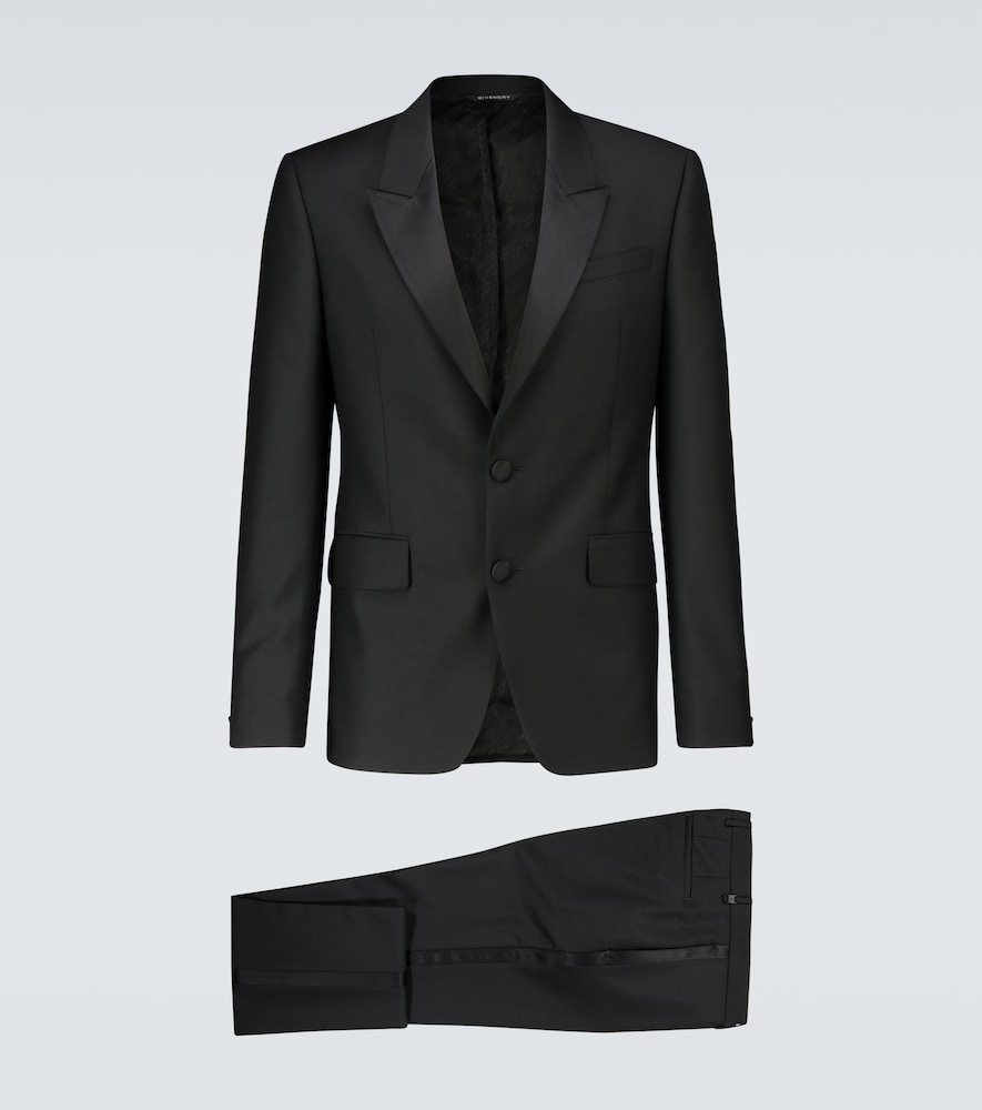 Crafted from a wool and mohair blend, this black tuxedo from Givenchy is tailored in a single-breast