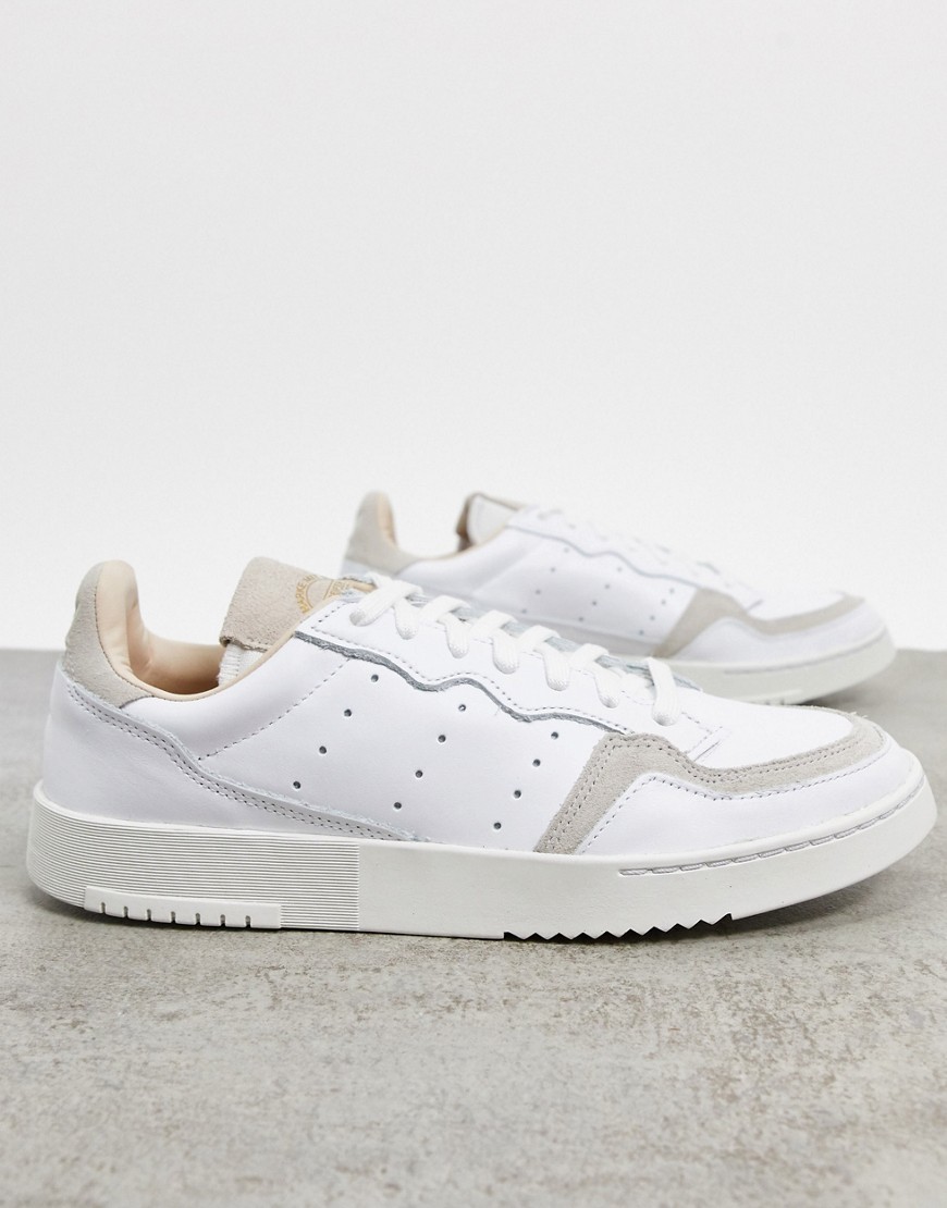 Trainers by adidas If in doubt, trainers Low-profile design Lace-up fastening Padded tongue and cuff