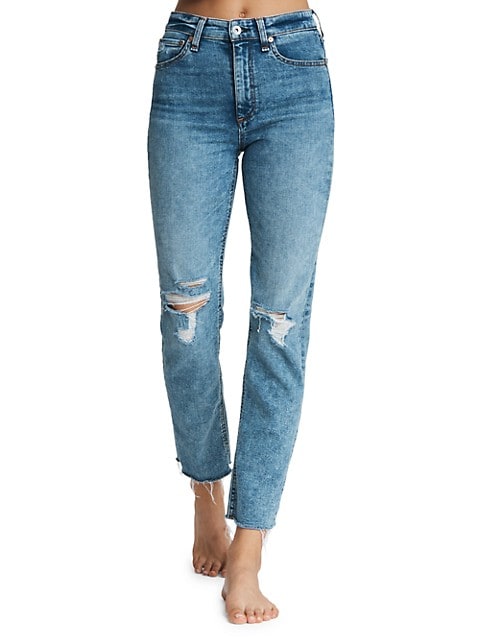 Distressed knees merge with a faded aesthetic to garner vintage style jeans.; Zip fly with button cl
