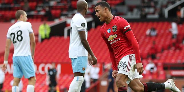 Selebrasi penyerang muda Manchester United, Mason Greenwood, usai menjebol gawang West Ham.  (c) AP Photo