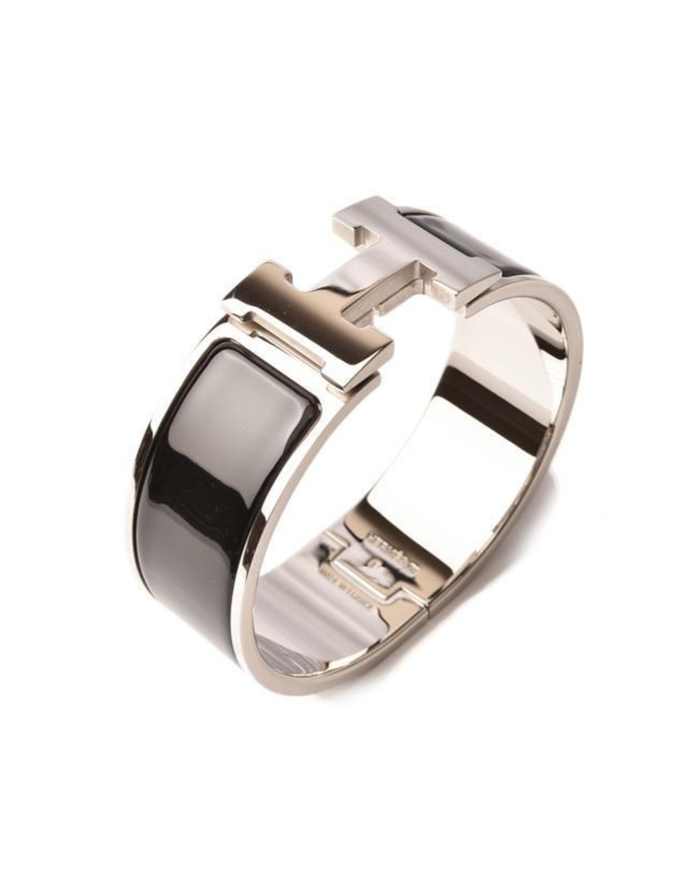 很好 這是愛馬仕（Hermes）的時尚手鍊，既經典又現代。它是一條拋光的銀質錶帶，一側具有鉸鏈，並在突出側打開了可旋轉的愛馬仕