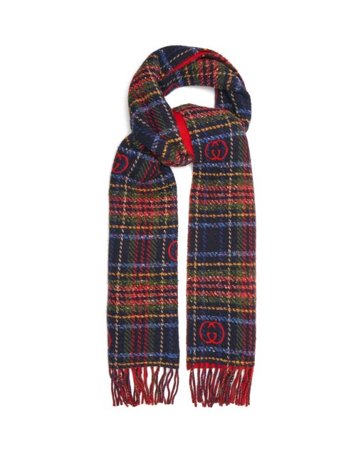 Gucci - This scarf is part of Gucci's Epilogue collection and features a multicoloured tartan that n