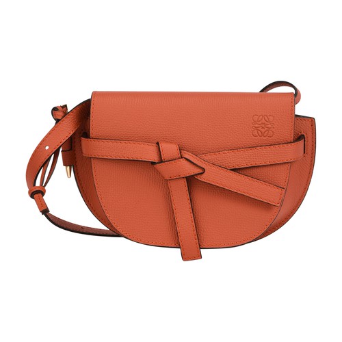 The Gate mini bag is a signature piece from Loewe with an adjustable strap that makes it very versat