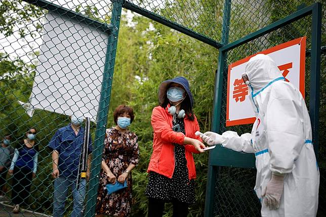 Beijing Officials Declare Outbreak Under Control