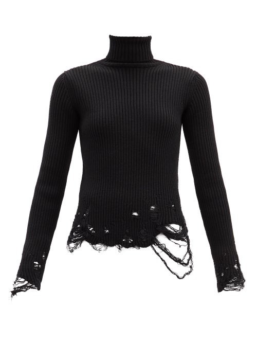 Balenciaga - Balenciaga puts a deconstructed spin on classic knitwear with this black roll-neck swea