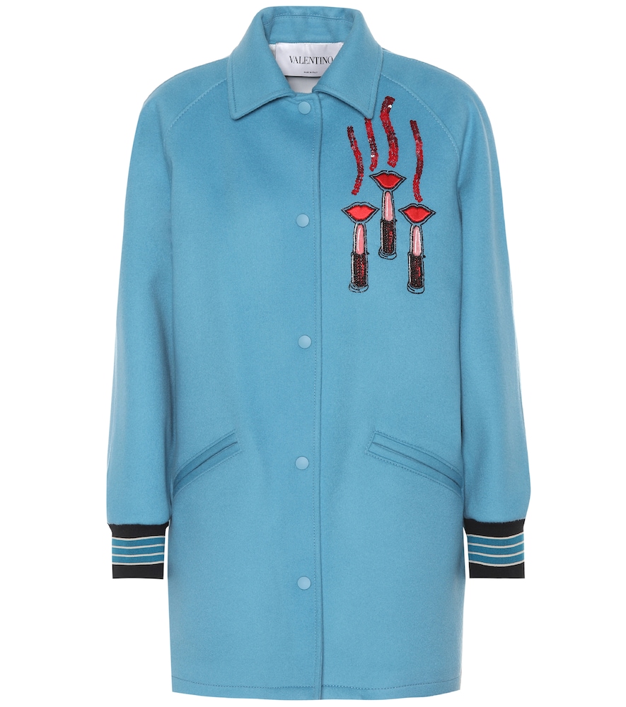 Valentino's wool and cashmere jacket reflects the season's emphasis on sporty motifs - the ribbed cu