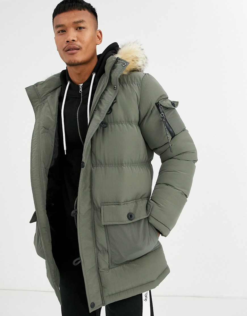 Coat by SikSilk Cosy level: considerable Hooded neck with faux-fur trim Zip placket Press-stud closu