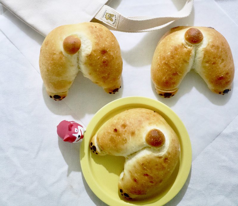 奶油先生獨家研發手工造型麵包 使用奶油家自培野生酵母製成 可愛的柯基屁屁造型跟本狗一模一樣唷!