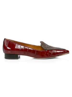 These refined point-toe loafers are crafted of eel and leather and topped with luxe calf hair panel 