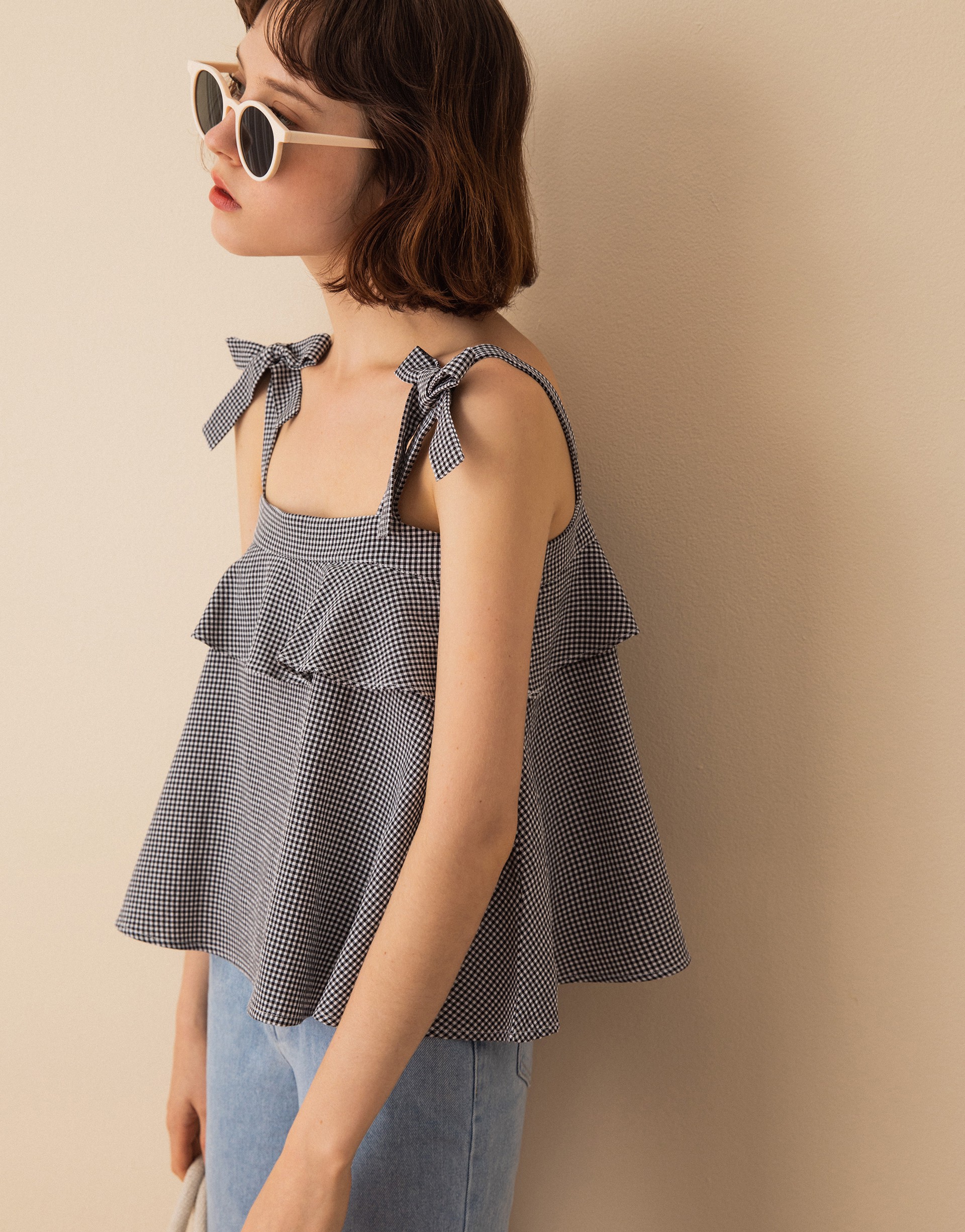 固定式肩帶/蝴蝶結造型綁帶/前後波浪造型設計/質感小格紋面料/無內裡