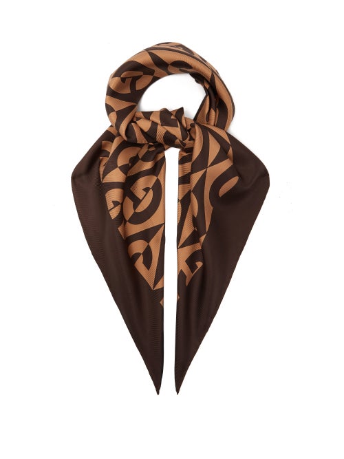 Gucci - The Rhombus print on this brown Gucci scarf is inspired by designs from the house's 1930s ar