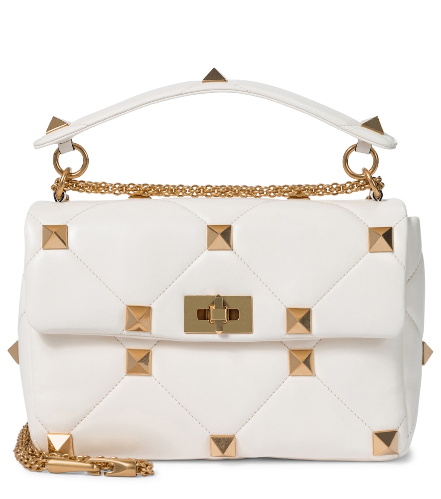 Valentino Garavani updates its iconic hardware on the Roman Stud Small shoulder bag.
