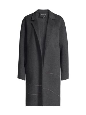 Luxurious cashmere topper in a chic oversized silhouette is embellished with delicate beading.; Notc