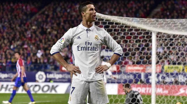 3. Cristiano Ronaldo (Real Madrid) - 42 gol dalam 44 laga. (AFP/Gerard Julien)