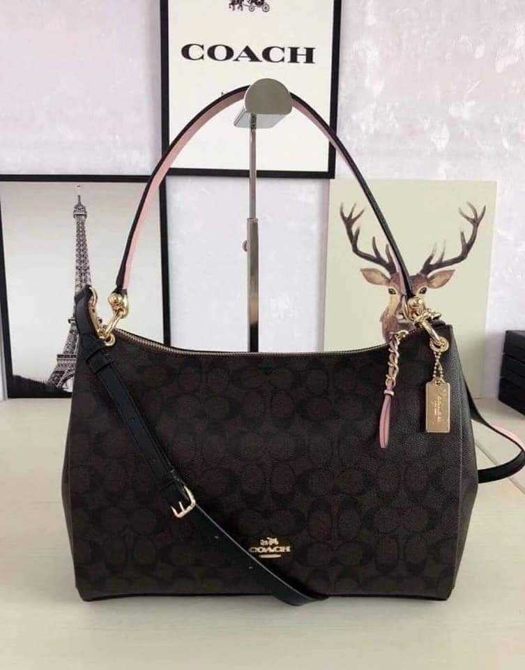 Mia shoulder bag discount in signature canvas
