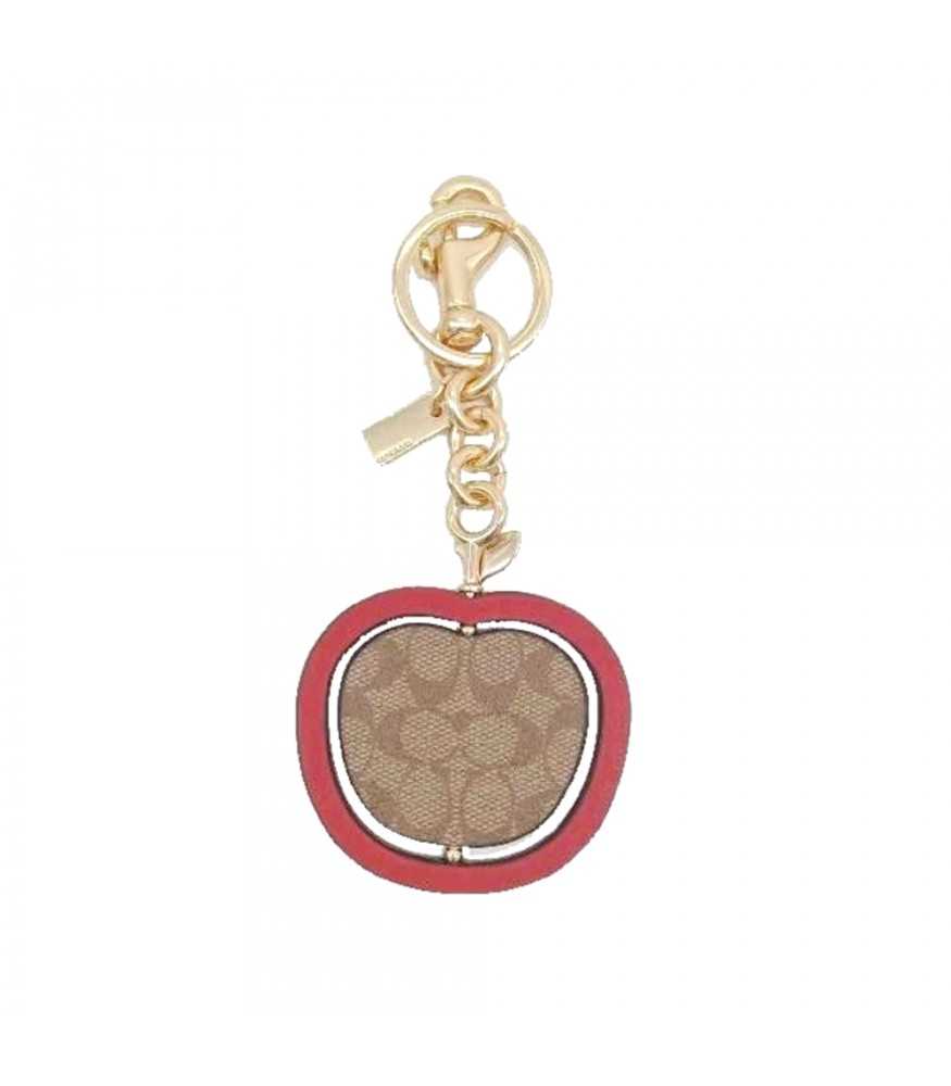 Coach apple bag outlet charm