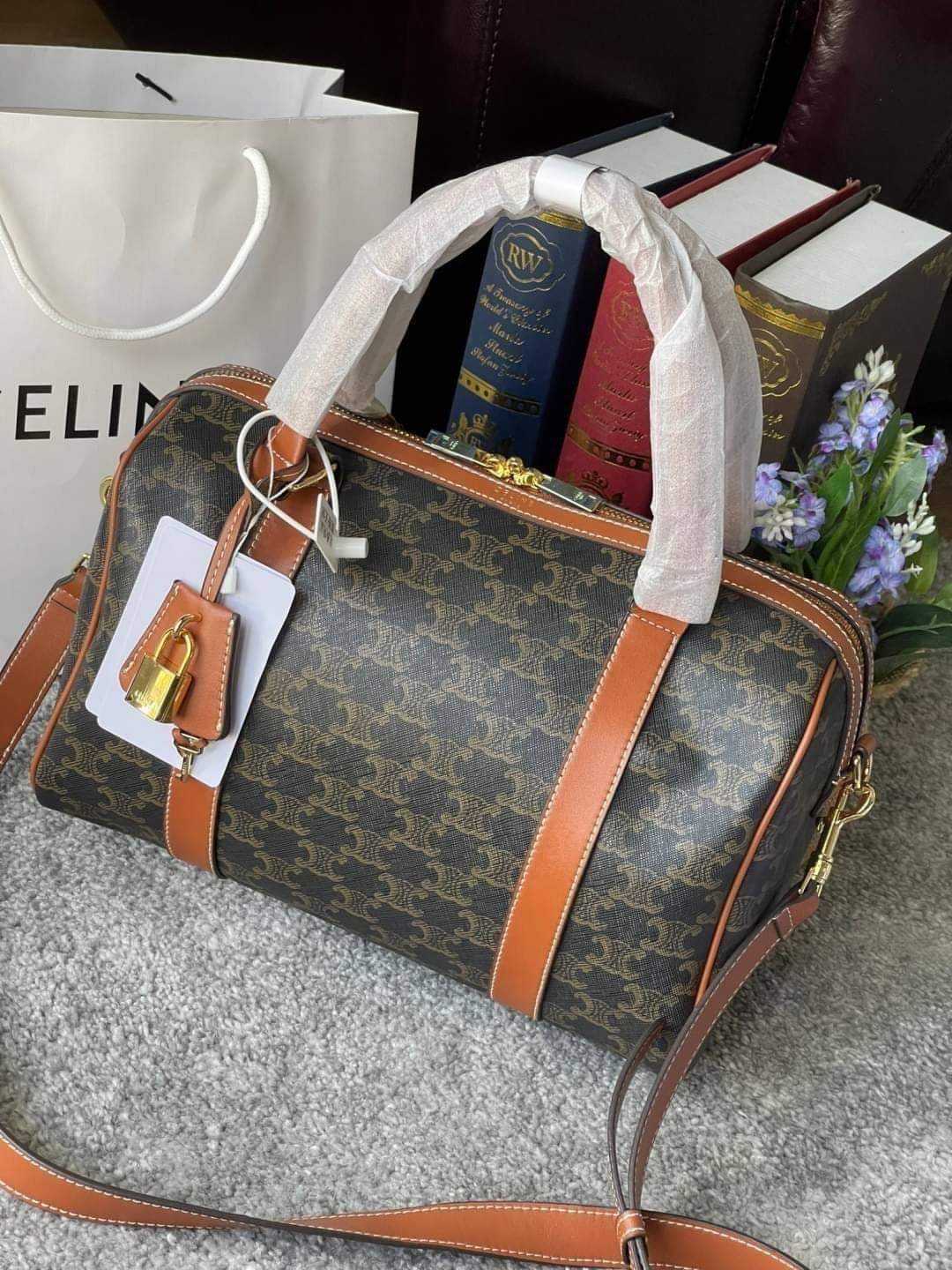 Boston bag in triomphe canvas sales