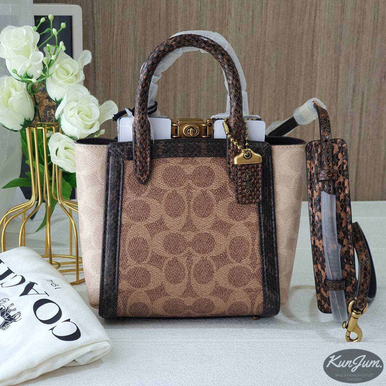 Coach troupe tote hotsell 16 in signature canvas