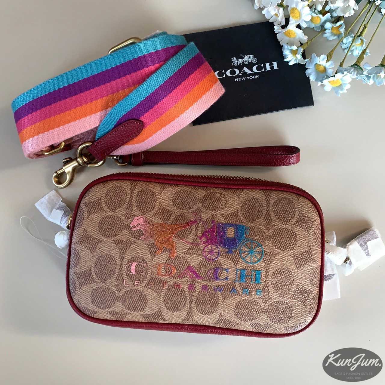 Sadie crossbody clutch with rexy outlet and carriage