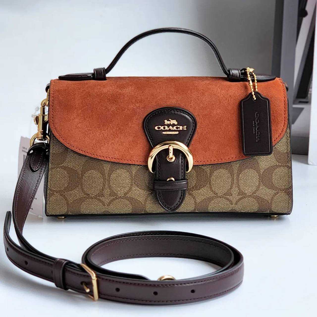 Coach top handle sales pouch in signature canvas