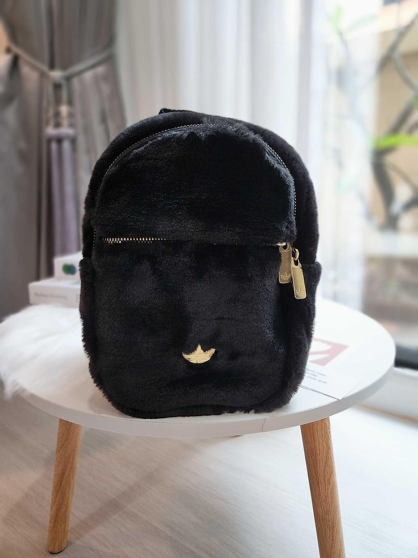 Adidas mini fur backpack online