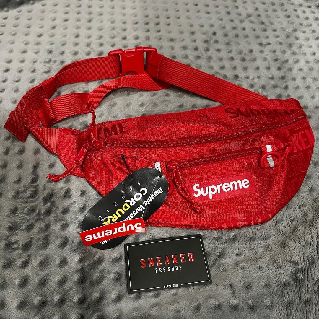 wearing supreme waist bag