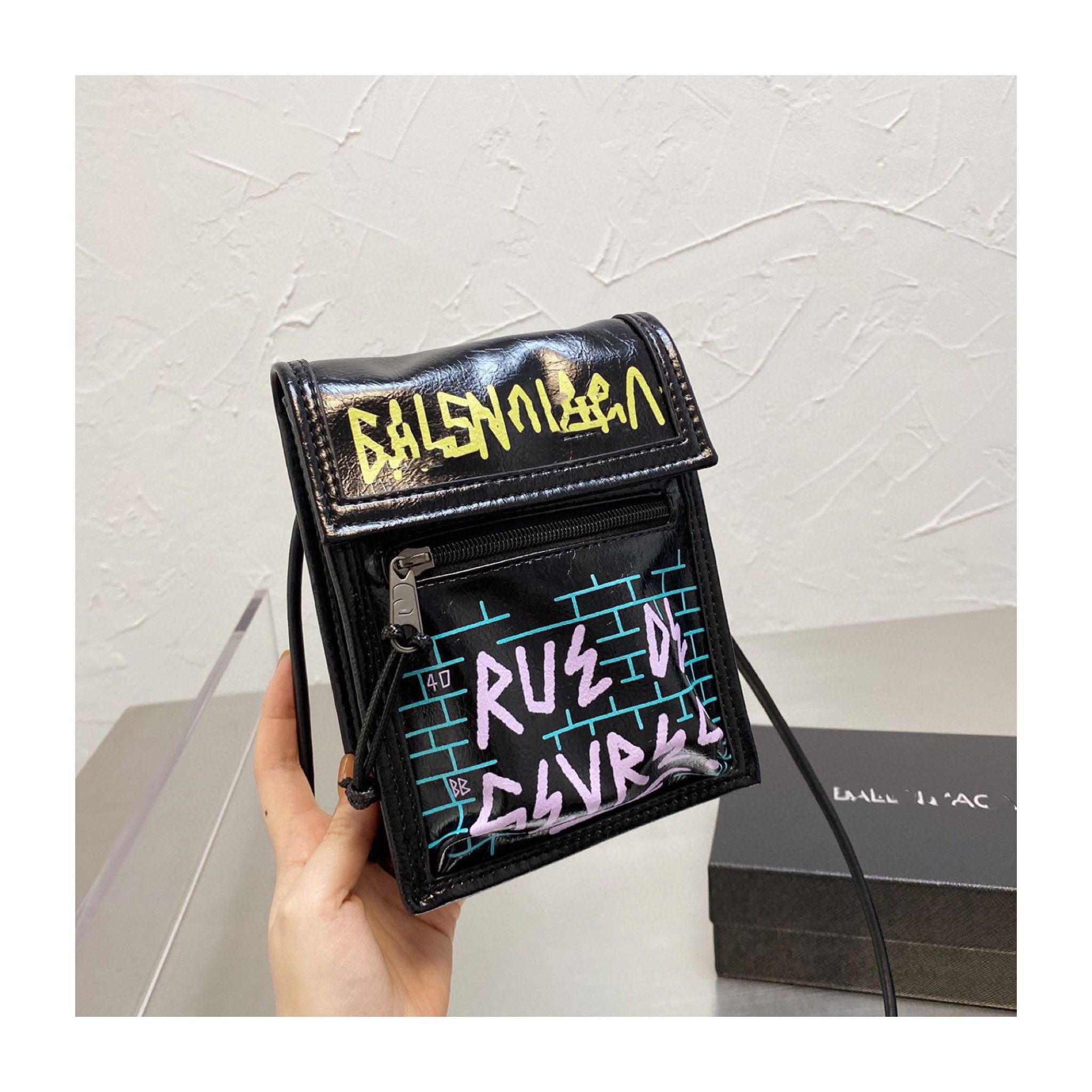 Balenciaga graffiti pouch bag sales