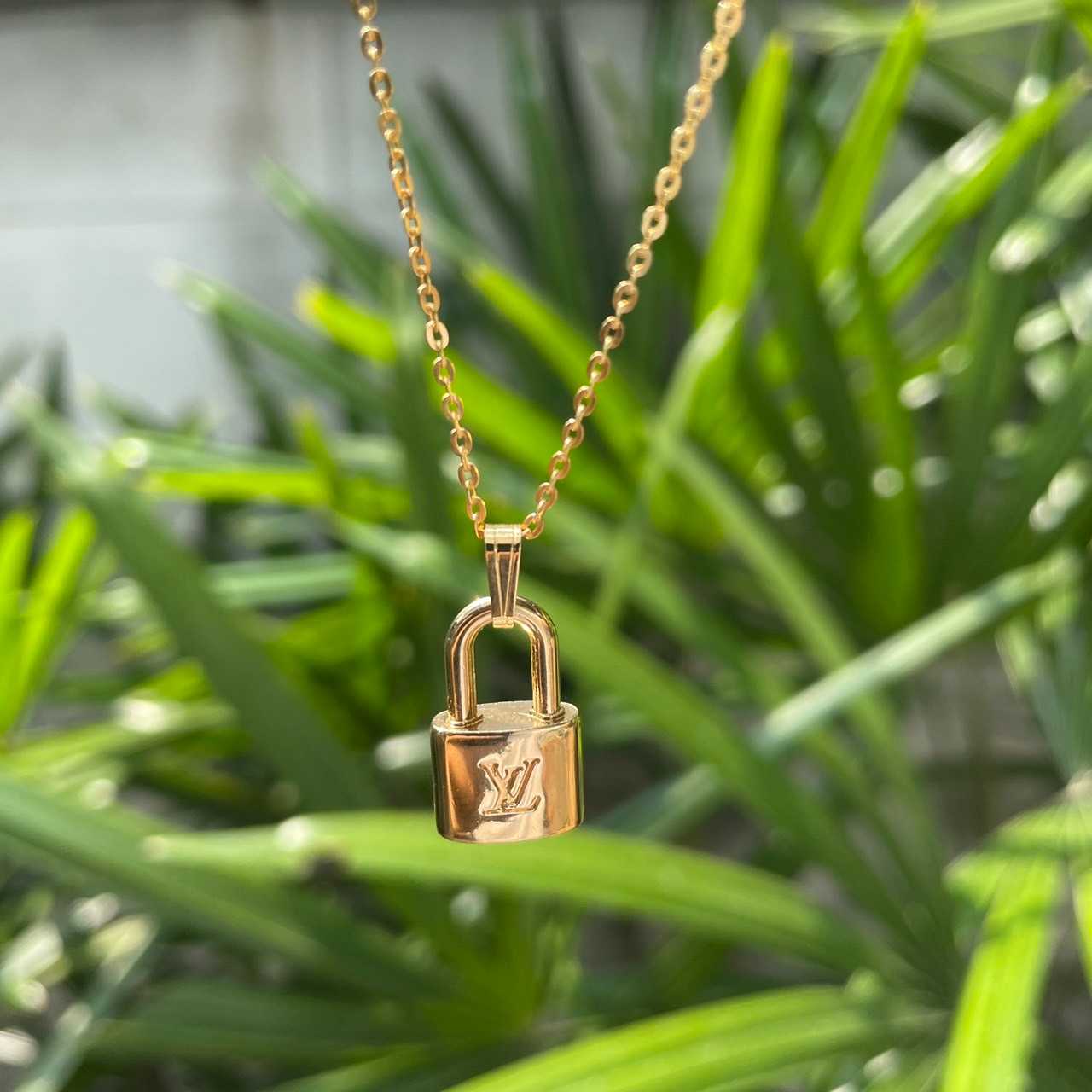 Louis Vuitton mini lock necklace