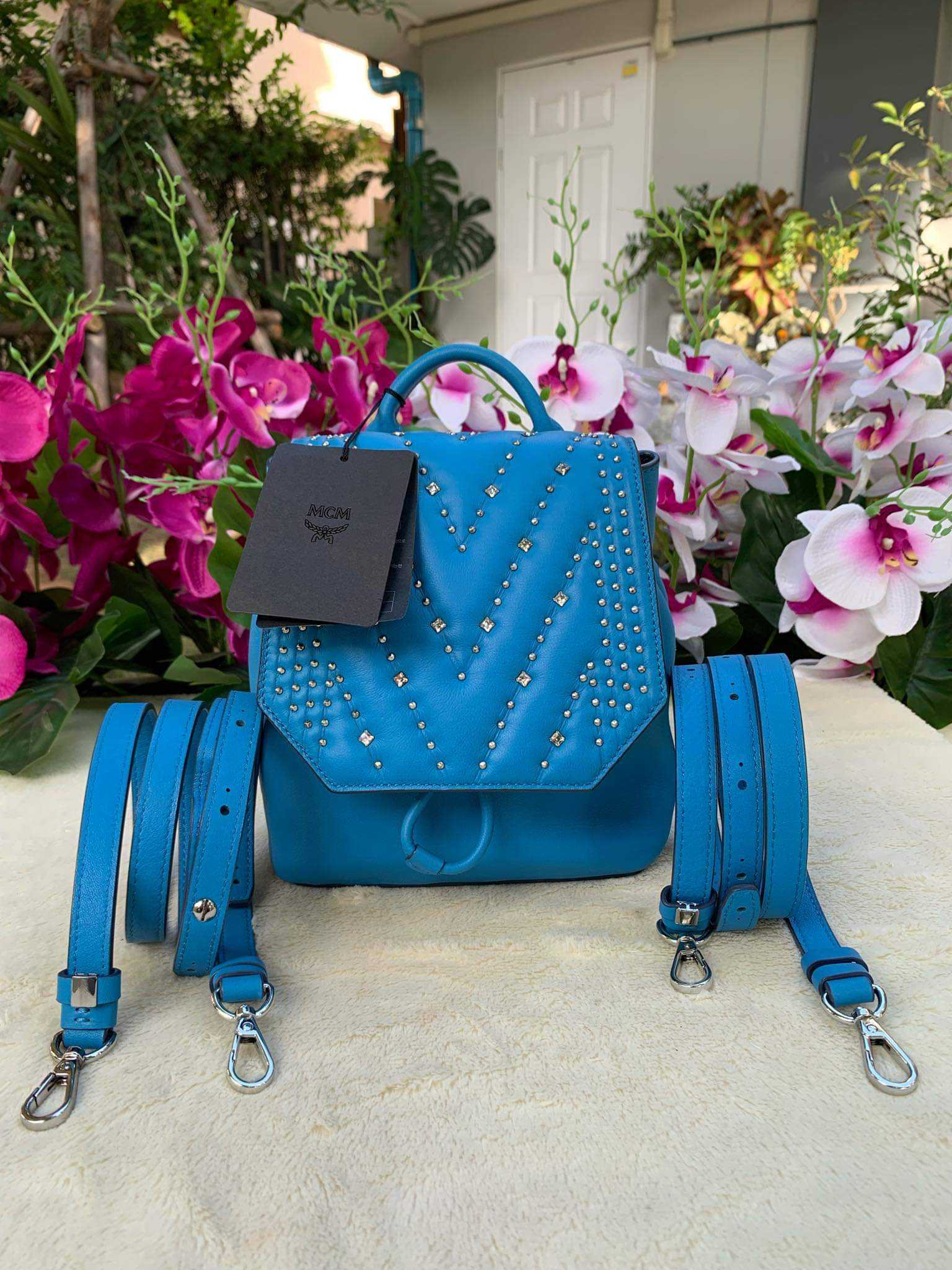 Mcm online swarovski backpack
