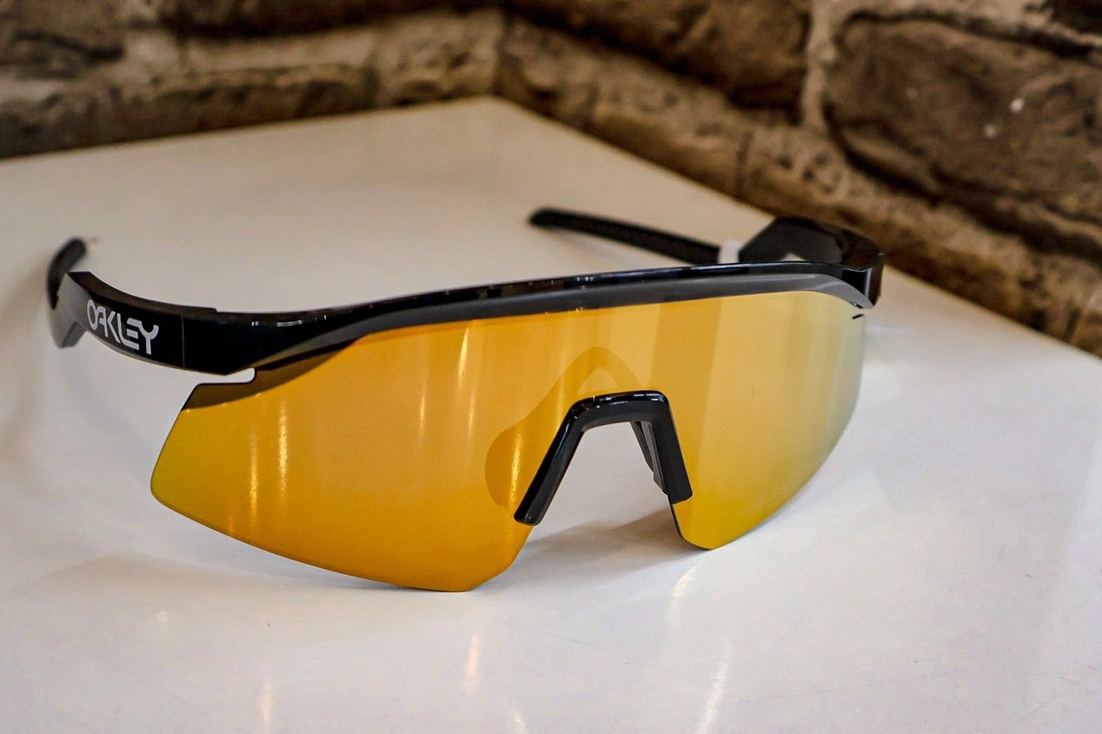 Black and yellow oakley top sunglasses