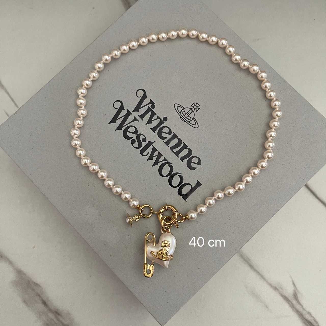 Vivienne westwood necklace price hot sale